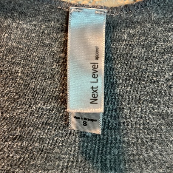 Next Level Apparel tank top size small: “Does this ring make me look engaged” - Picture 2 of 3